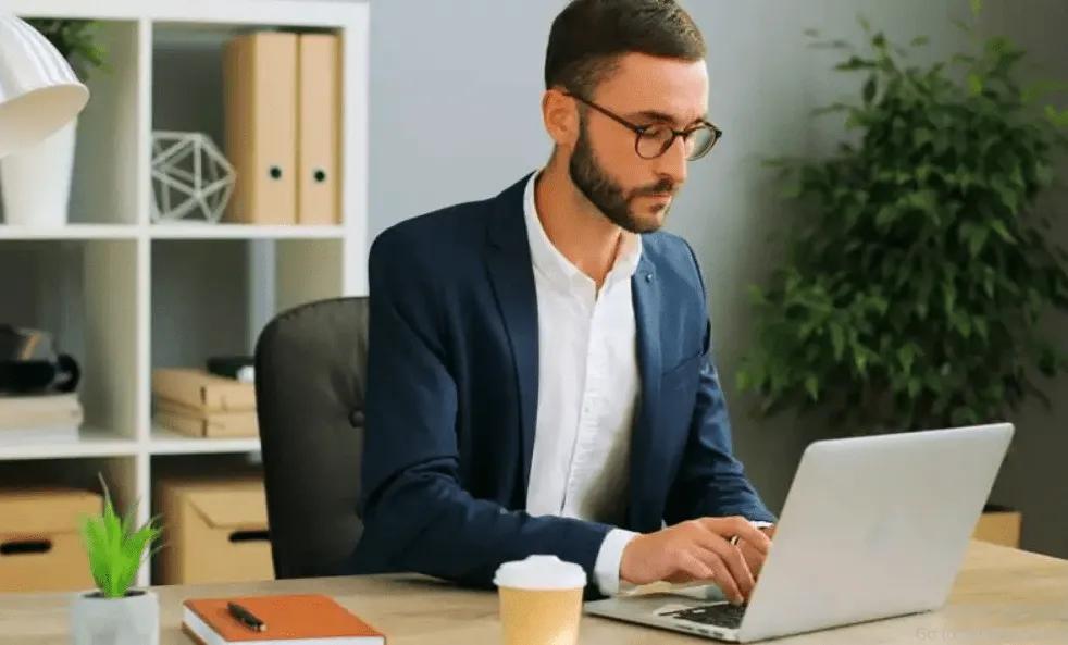 Guy Using Laptop