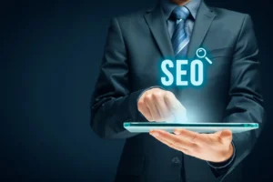 Search engine optimization - SEO concept. Businessman or programmer is focused to improve SEO and web traffic.