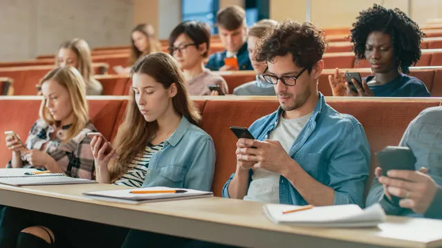 Students on their phones in class