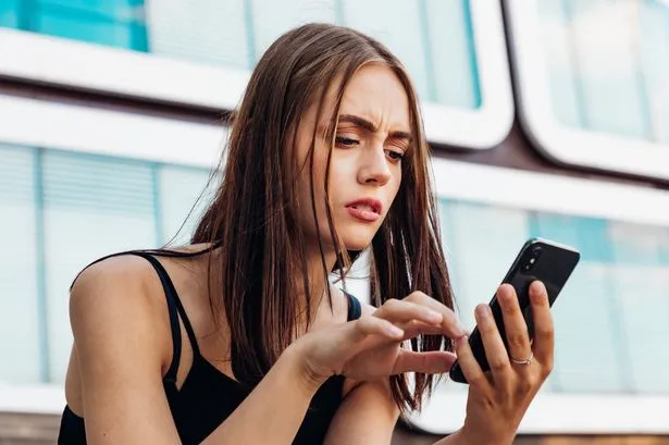 Woman Texting on an Android Phone