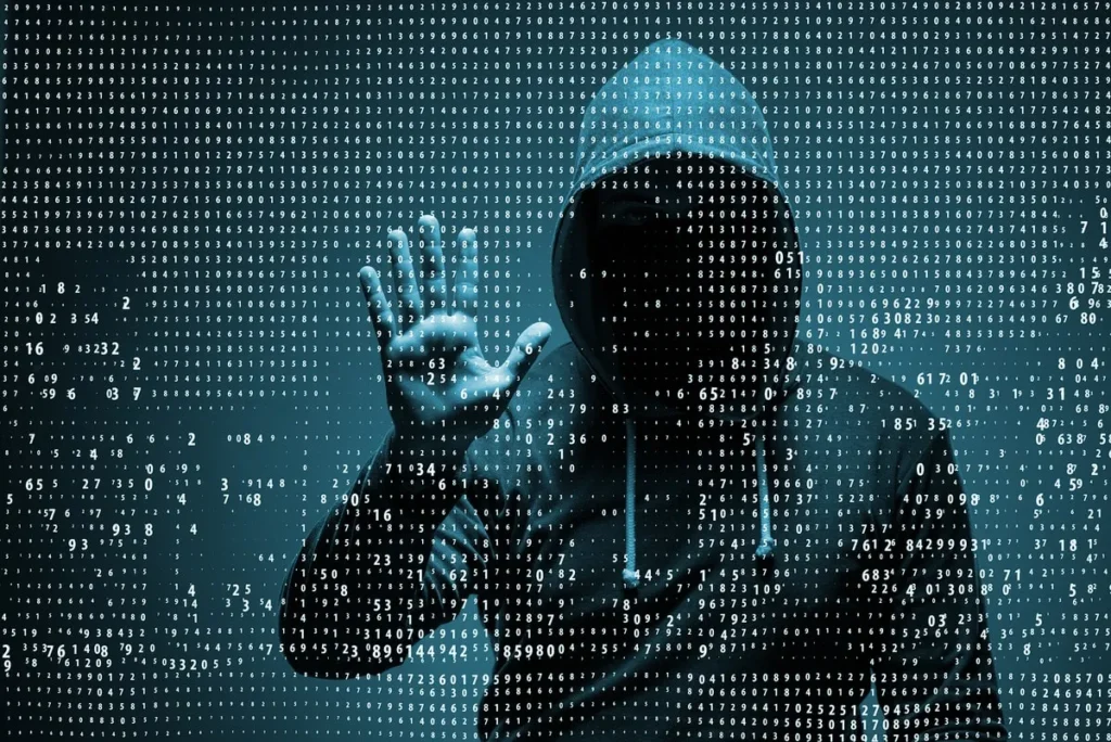 hooded man shadowy figure behind wall of numbers concept of ai cybersecurity